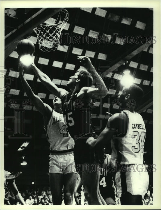 1987 Press Photo Albany Patroons basketball action in New York - tus01904- Historic Images