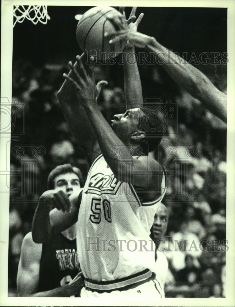 1990 Press Photo Albany Patroons #50 Ben McDonald gets shot blocked by Texan&#39;s- Historic Images