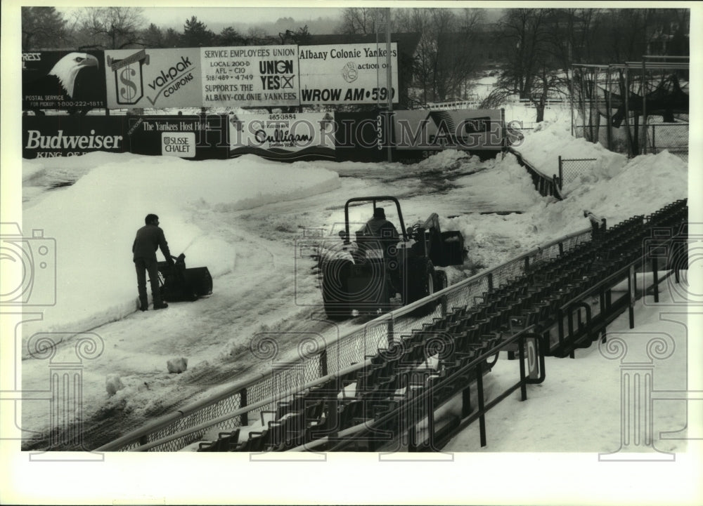 Press Photo Crew removes snow from infield at Heritage Park, Colonie, New York- Historic Images