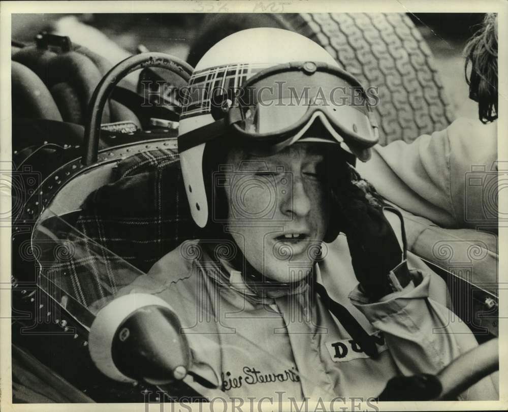 1968 Press Photo Race car driver Jackie Stewart rubs his eyes in race car- Historic Images