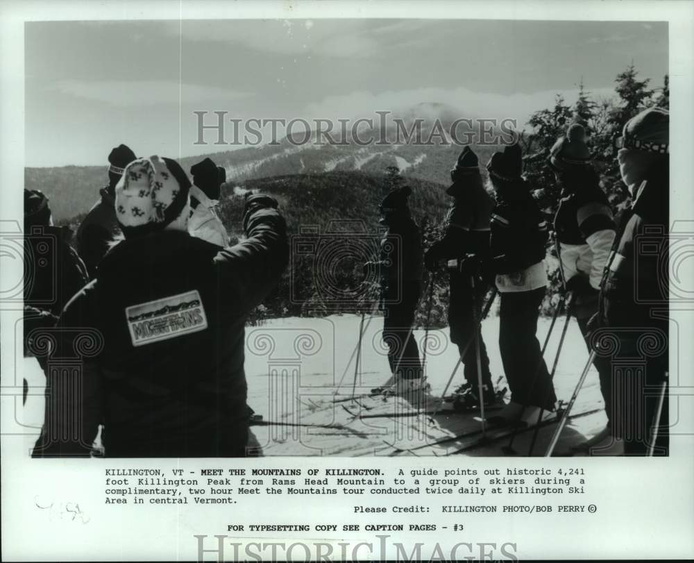 Press Photo A guide points out historic Killington Peak in Vermont to ski group- Historic Images