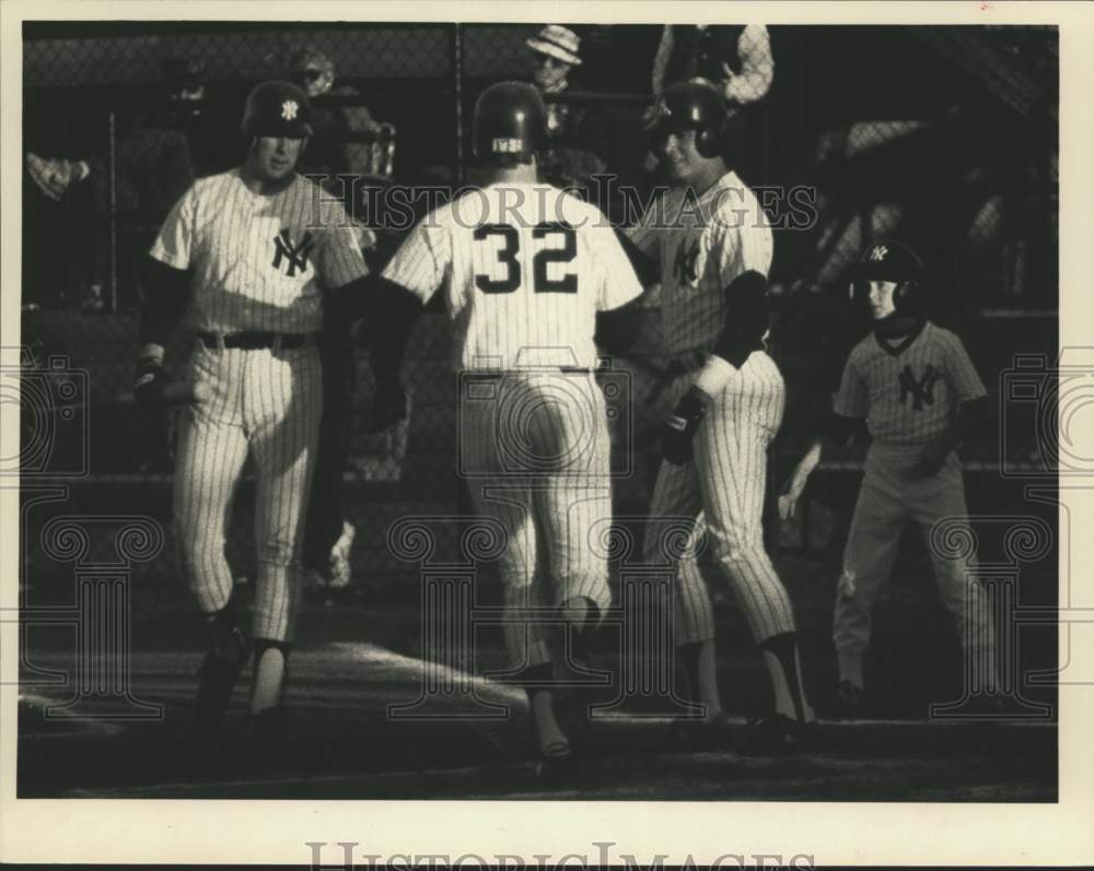 Press Photo Yankees baseball players celebrate at home plate - tus06256- Historic Images