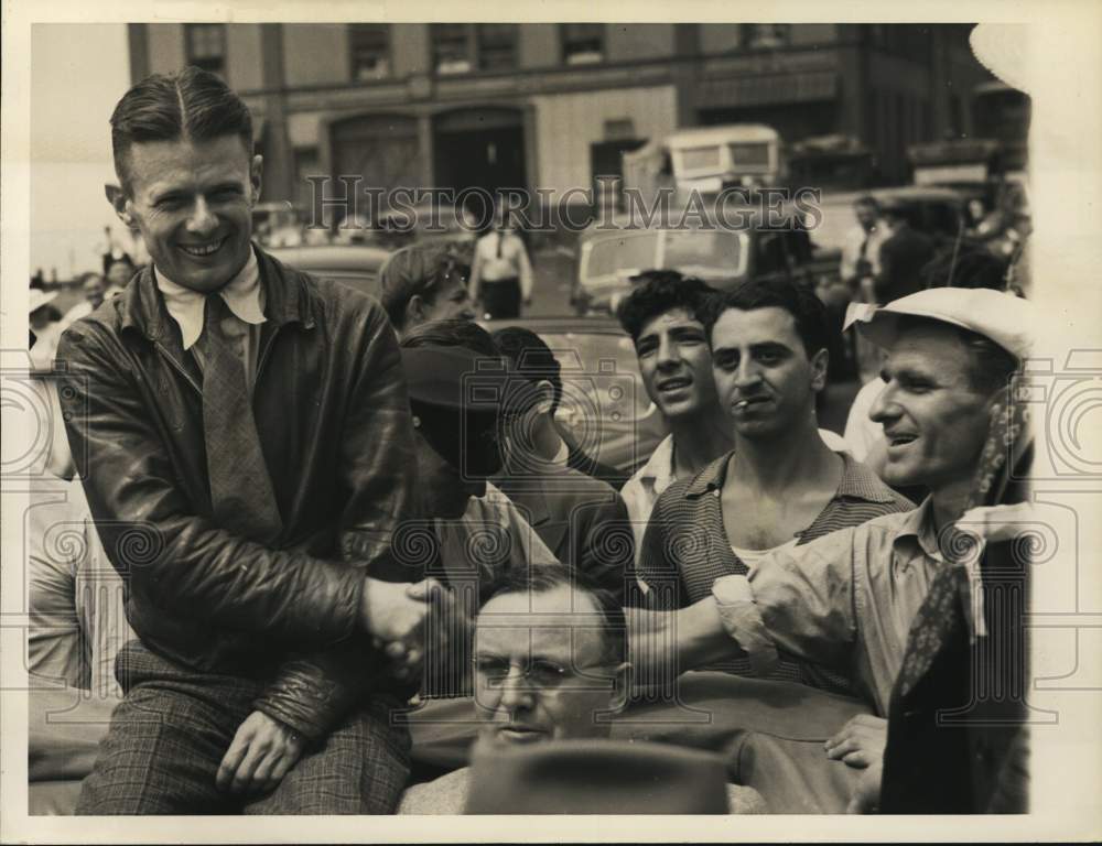1938 Press Photo Aviator Doug Corrigan shakes hand with gentleman in New York- Historic Images