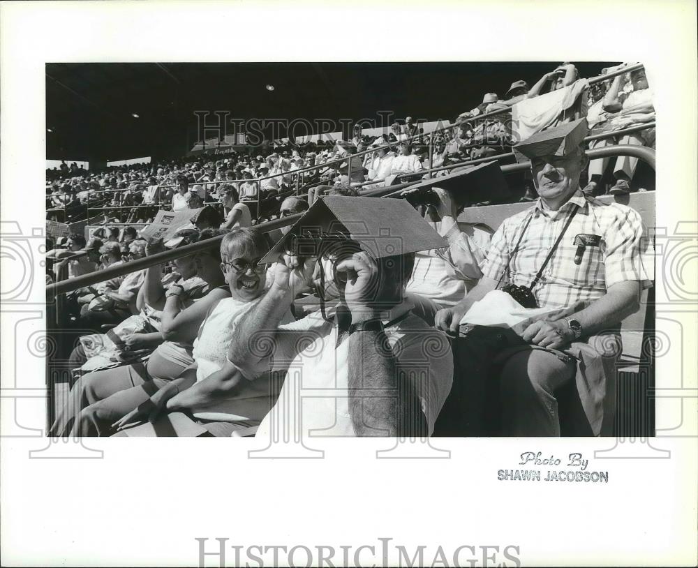 1987 Press Photo Fan shades his eyes at the Baseball Park - Fairgrounds - Historic Images