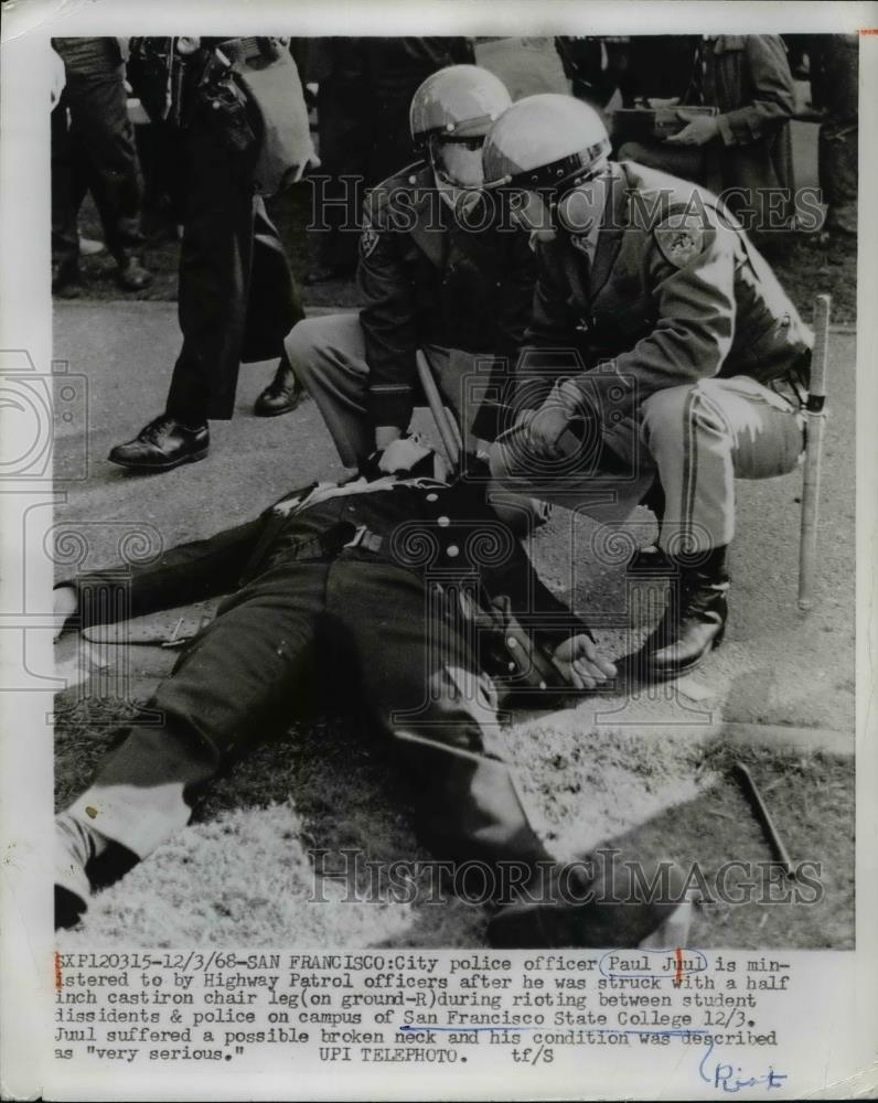 1968 Press Photo Officer Paul Juul Tended to After Student Rioter Attack - Historic Images