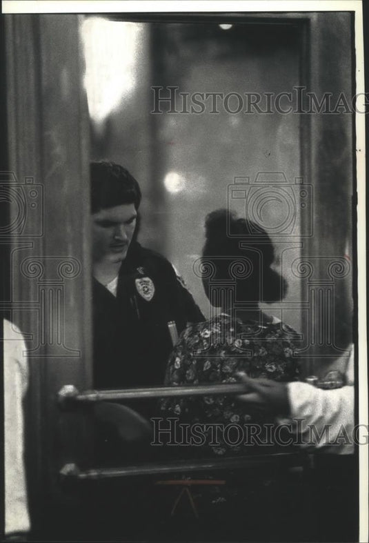 1991 Press Photo Security Guard inspects patron at showing of "Boys N the Hood." - Historic Images