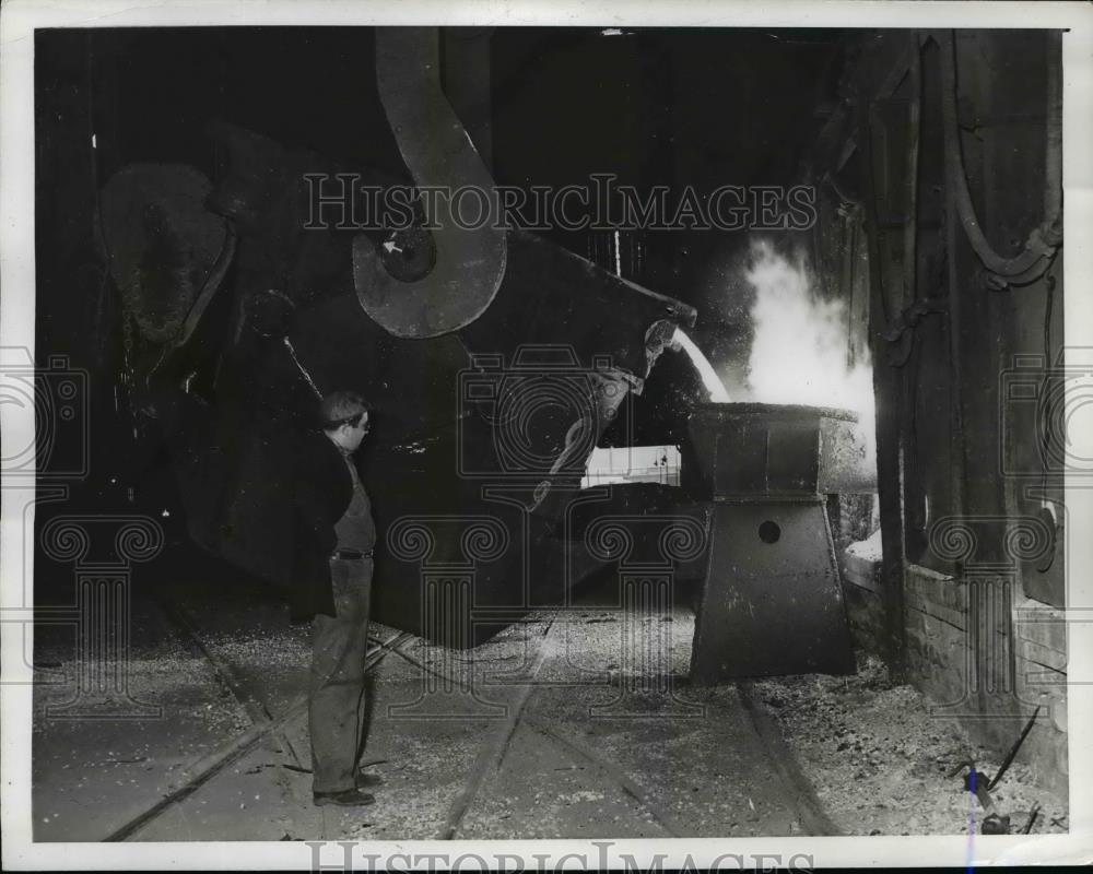 1941 Press Photo Pouring Molten Iron Into Open Hearth Furnace - nem45691 - Historic Images