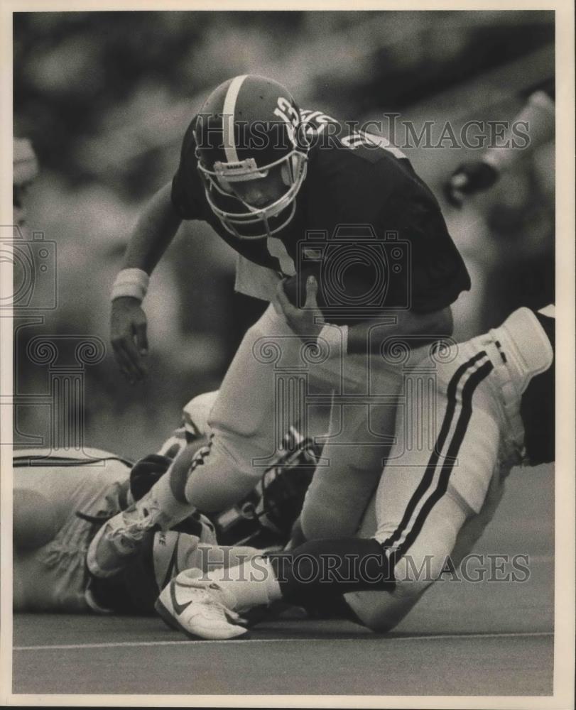 1987 Press Photo Alabama football player #13 David smith runs with the ball. - Historic Images