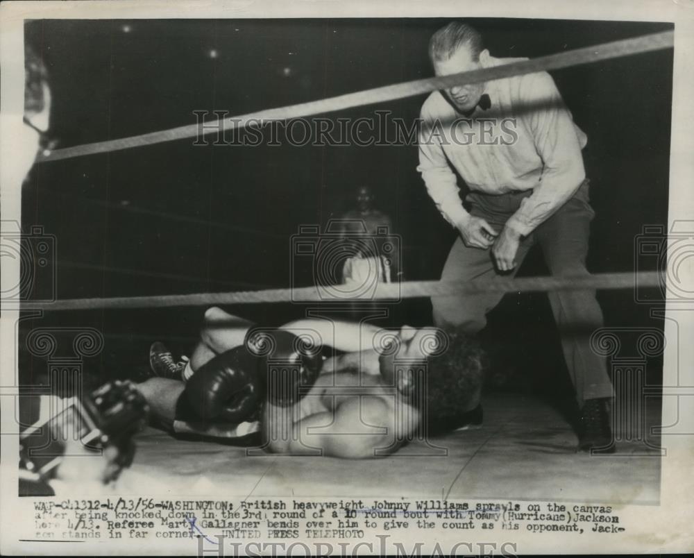 1956 Press Photo Johnny Williams Sprawls After Knock Down by Tommy Jackson - Historic Images