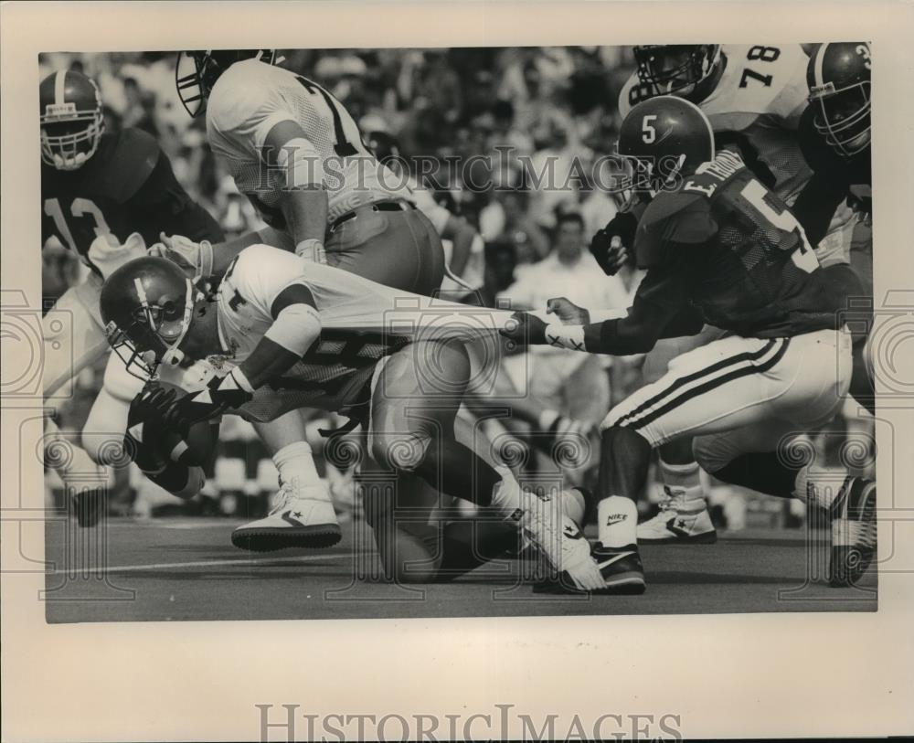 Press Photo Alabama Football&#39;s Thomas Grabs Southern Mississippi&#39;s Tony Smith - Historic Images