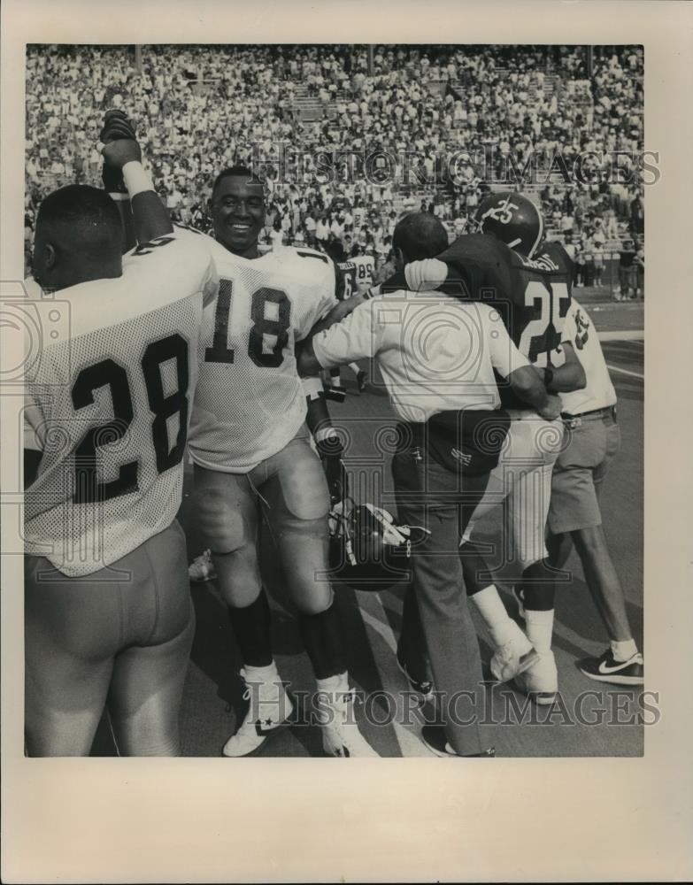 Press Photo Southern Mississippi Celebrates Football Win As Alabama Player Hurt - Historic Images