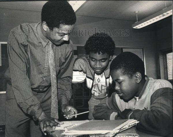 Ed Mooney enjoys sharing his math students' success Milwaukee, 1988 ...