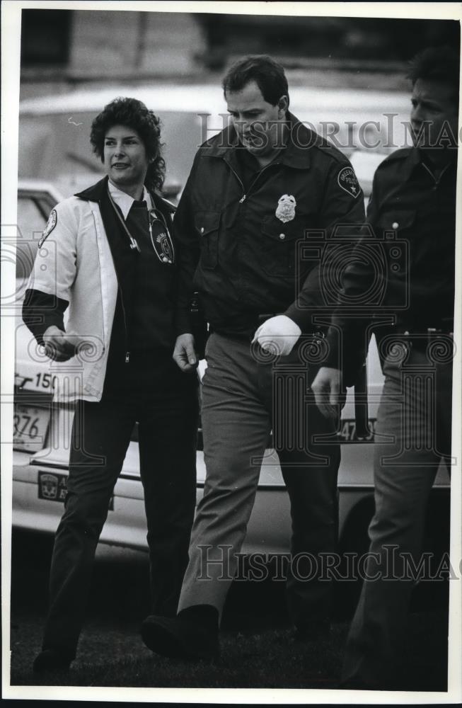 1991 Press Photo Police Officer injured during chase of robbers in Greenfield - Historic Images