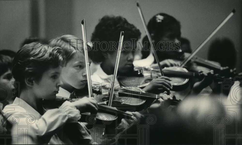Students from Elm School for Creative Arts perform at concert, 1985