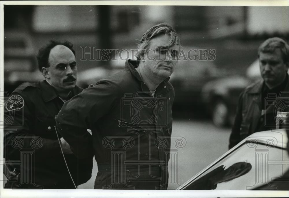 1991 Press Photo Thomas Eckert is charged with attempted homicide and robbery. - Historic Images