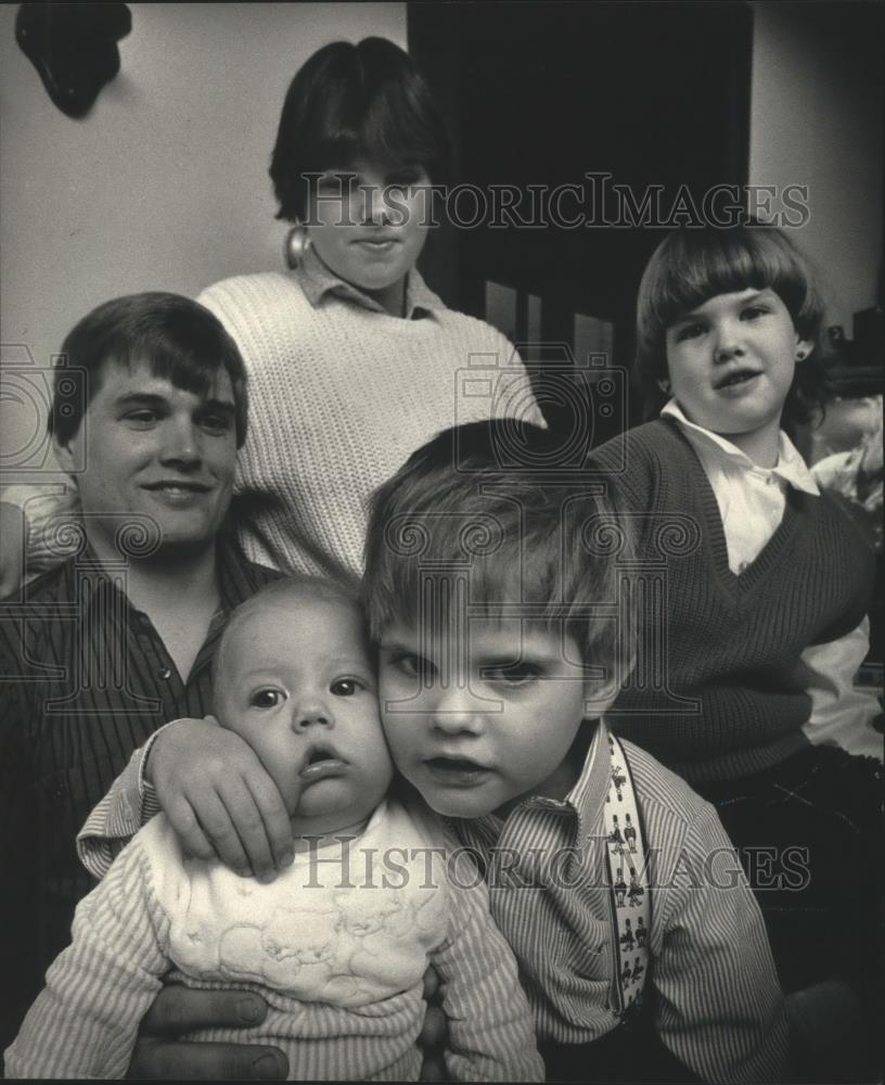 1987 Press Photo 5-Month-Old Craig Salkowski Surrounded by Family - mjb06388 - Historic Images