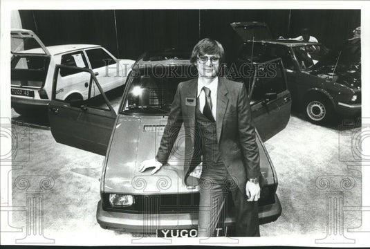 1984 Press Photo Miroslav Kefurt, auto dealer, showing off his Yugo 45 - Historic Images