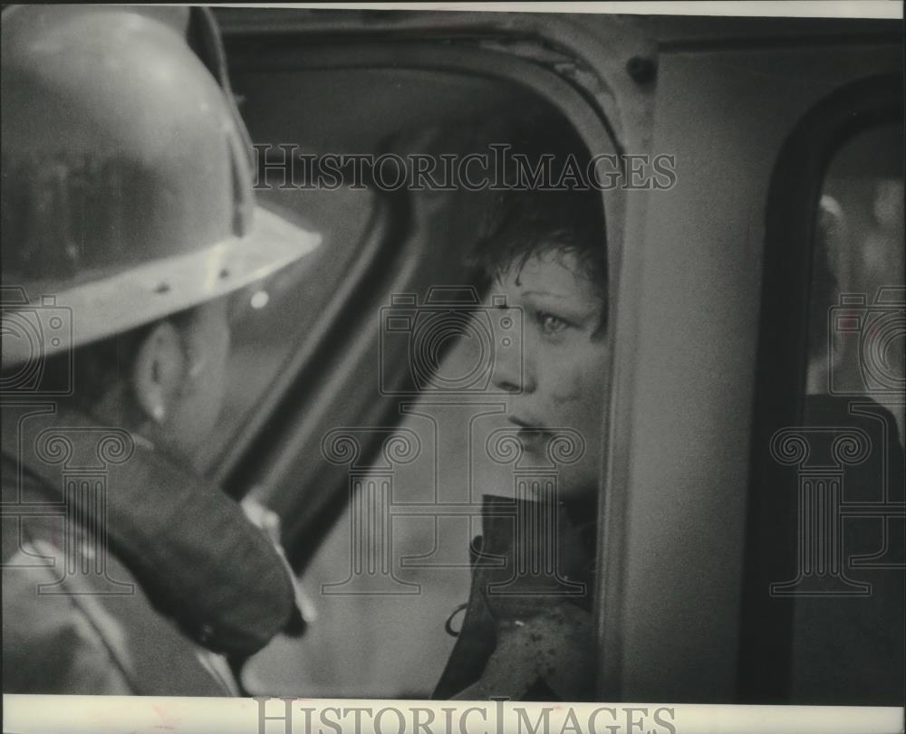 1978 Press Photo Mary Polaske, fire fighter training, sitting in truck - Historic Images