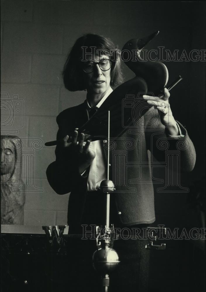 1991 Press Photo Pat Brophy with weather vane for Pius XI High School, Milwaukee - Historic Images