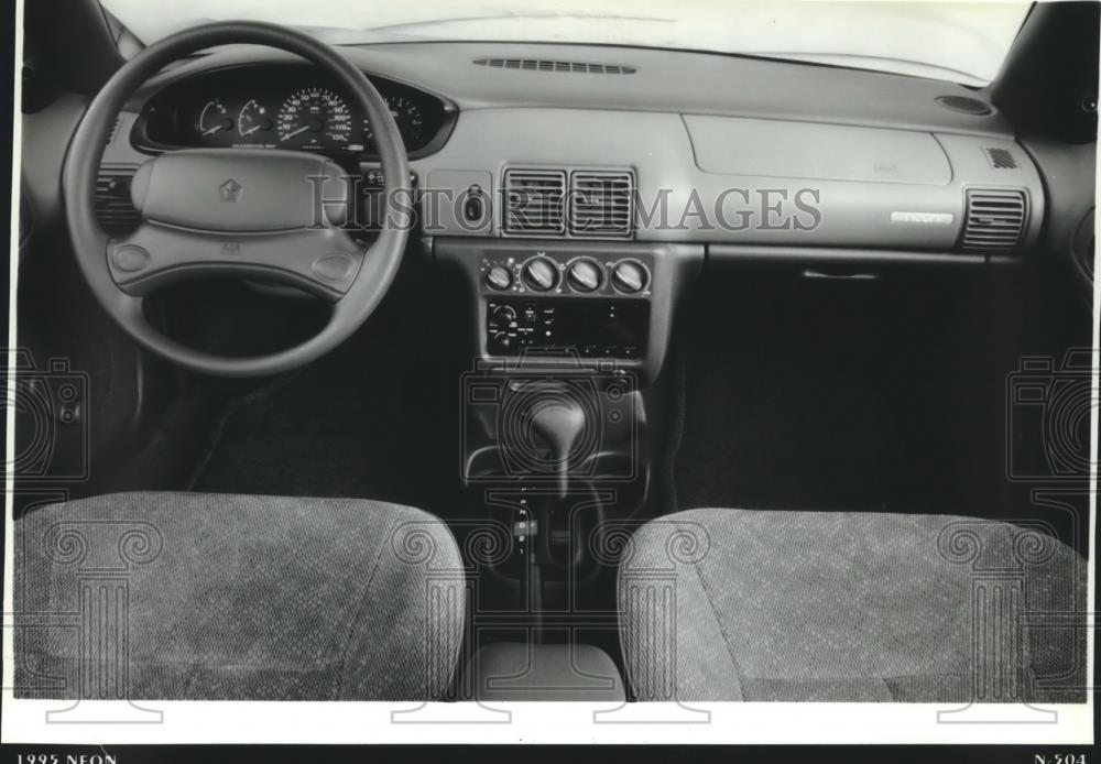 1994 Press Photo The dashboard of the Plymouth Neon is strikingly spare - Historic Images