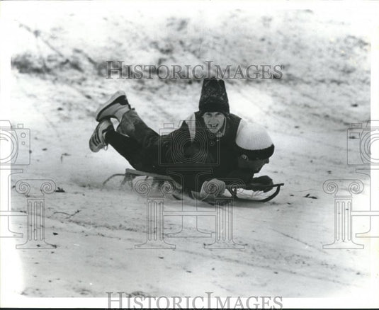 1982 Press Photo Richard Bailey and Kyle Kirkwood Sledding - abna17760 - Historic Images