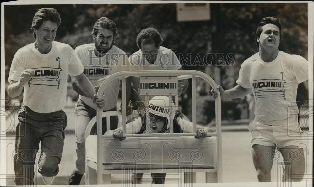 1987 Press Photo Team Participates in Bed Race, Birmingham, Alabama. - abna20678 - Historic Images
