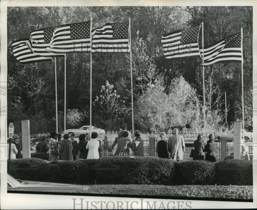 1977 Press Photo Veterans Day Spectators with American Flags - abna17215 - Historic Images