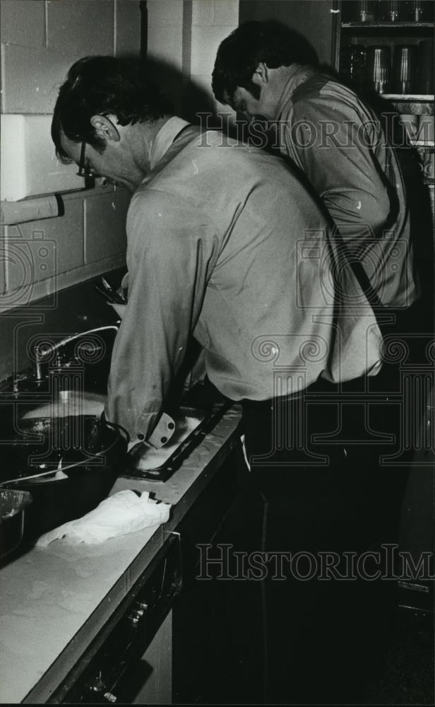 1979 Press Photo Unidentified firefighters on clean-up detail, Birmingham - Historic Images