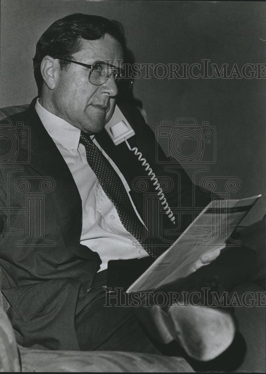Press Photo Mac Wagnon on phone - abna25958 - Historic Images