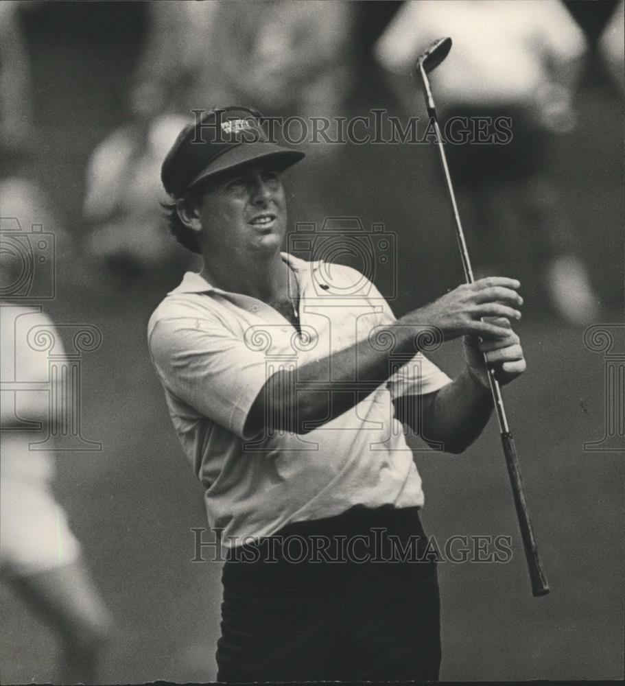 1984 Press Photo Golfer Watching Down The Course Fairway While Using Iron Club - Historic Images