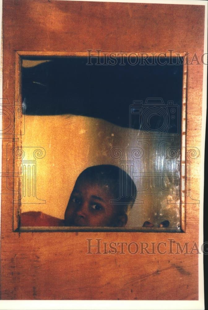 1993 Press Photo Timothy Firley watches Social Development Commission Basketball - Historic Images