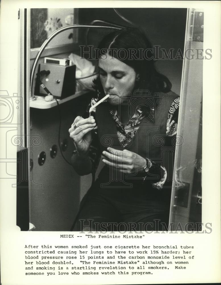 1977 Press Photo Woman Sitting While Smoking a Cigarette - mjc00672 - Historic Images