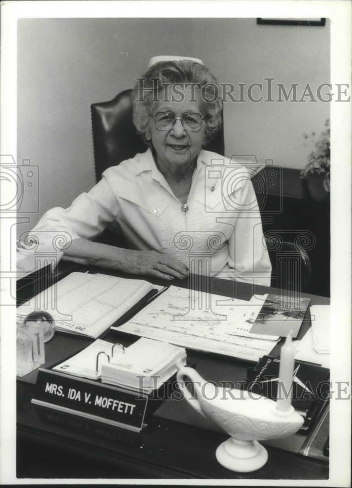 Press Photo Mrs. Ida V. Moffett sitting at her desk - abna36881 - Historic Images