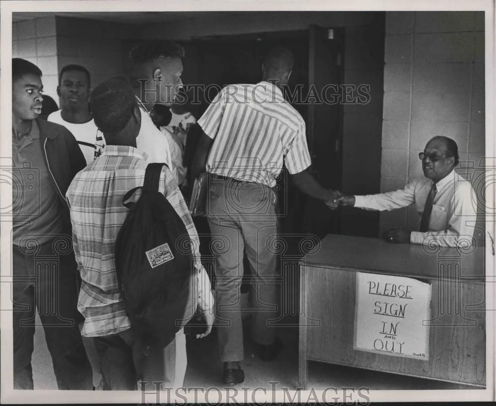 Press Photo Parker High School Principal Edward B. Thompson welcomes students - Historic Images