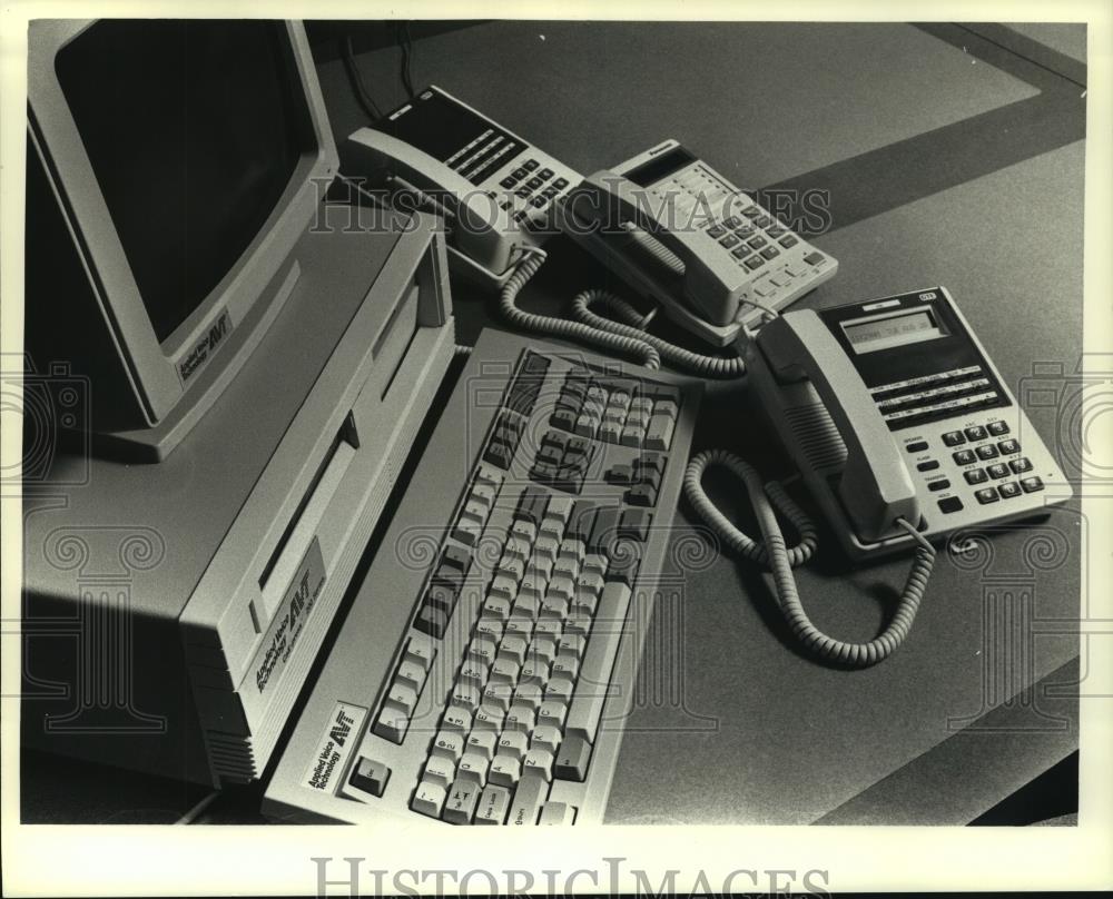 1992 Press Photo Telephones Sit Next to Computer - mjc07185 - Historic Images