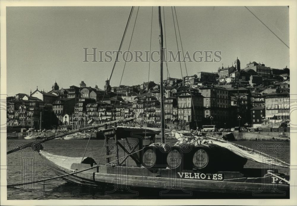 1989 Press Photo A boat docked at the small town of Oporto. Portugal - mjc07901 - Historic Images