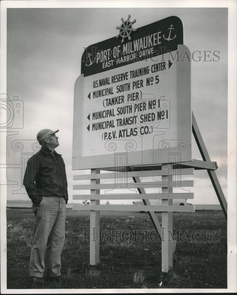 Press Photo Ray Scharping next to new sign at Jones Island, Milwaukee - Historic Images