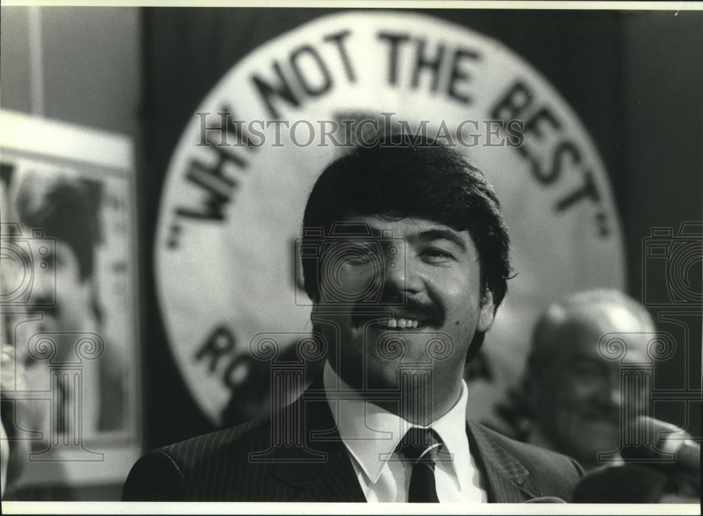 1982 Press Photo Richard Trumka stands in front of campaign slogan in Uniontown - Historic Images