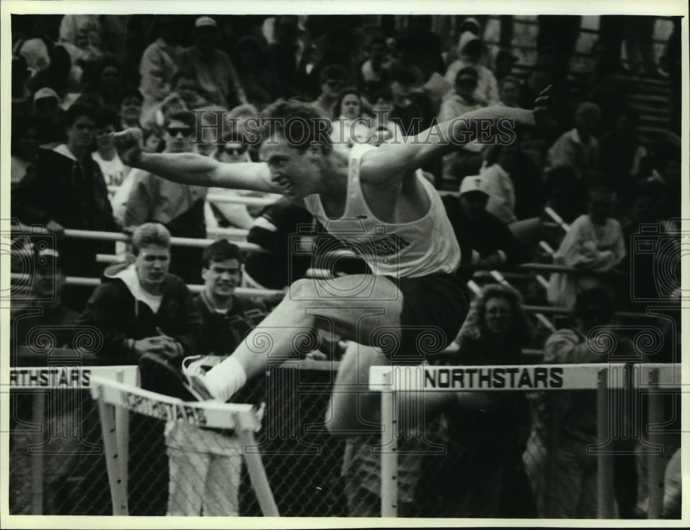 1993 Press Photo Waukesha North&#39;s Matt Diddion running hurdles, Wisconsin - Historic Images