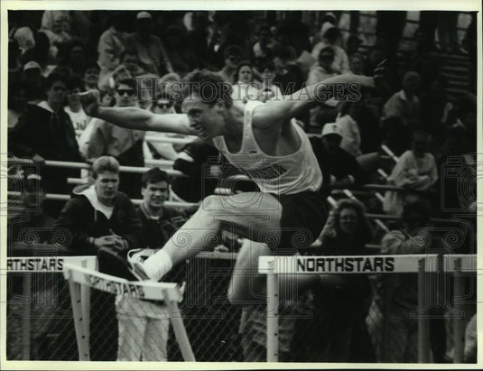 1993 Press Photo Waukesha North's Matt Diddion running hurdles, Wisconsin - Historic Images