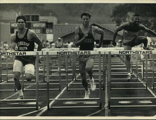 1991 Press Photo High school track athletes run in boys' 110-meter high hurdles - Historic Images