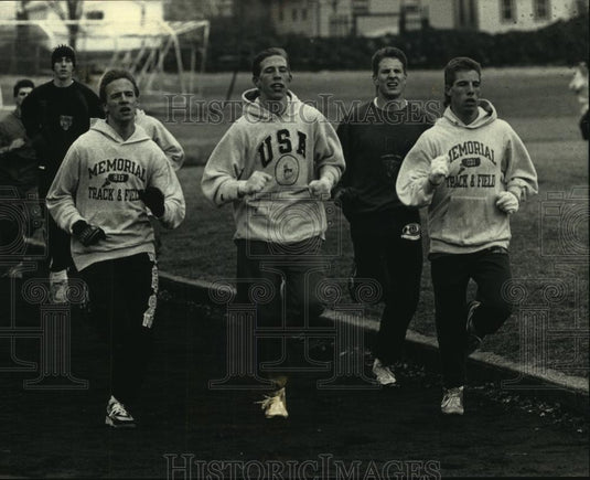 1991 Press Photo Catholic Memorial high school boys track team during workout - Historic Images