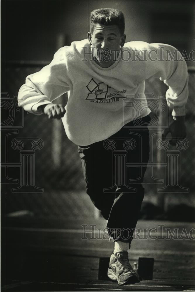 1993 Press Photo Pius XI hurdler Brody Buss competes for WISAA state title - Historic Images