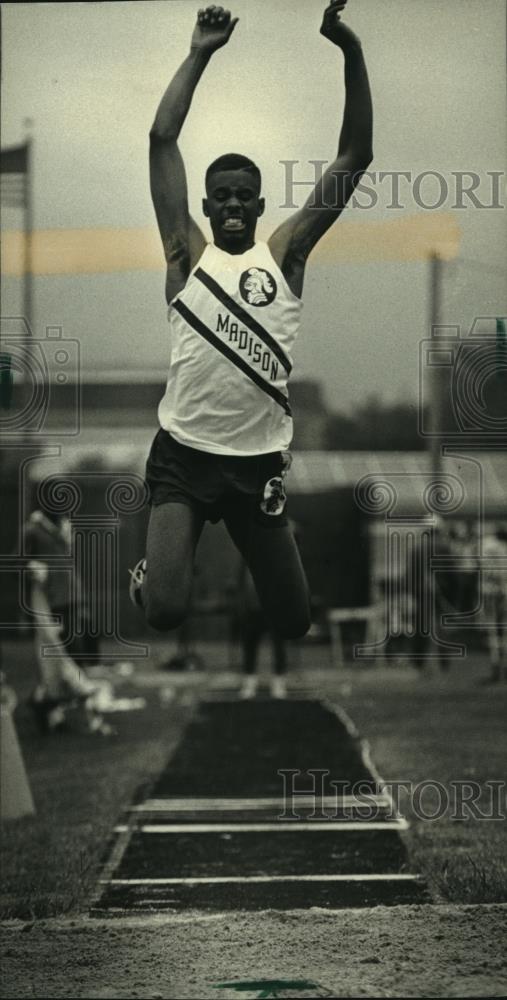 1993 Press Photo Madison High&#39;s Jon Fleming jumps triple jump at Nicolet. - Historic Images