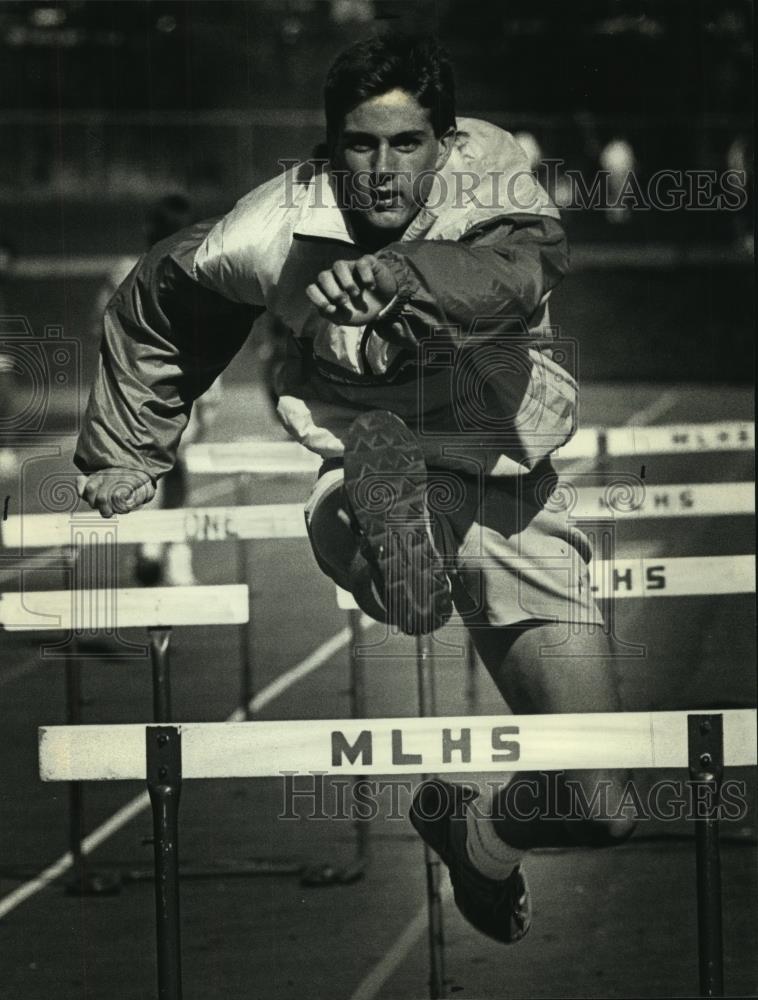 1991 Press Photo Tom Burger runs hurdles - mjc12727 - Historic Images