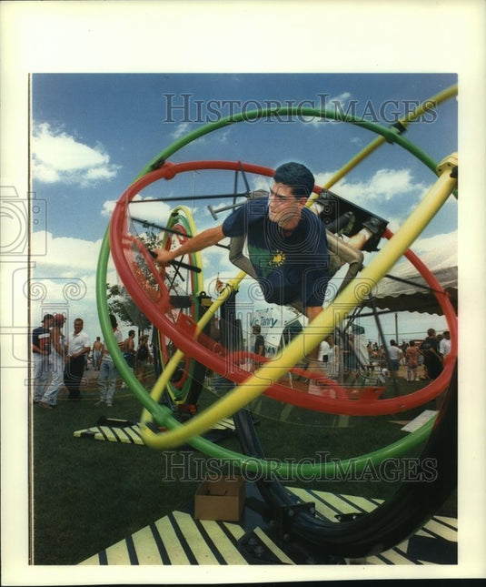 1994 Press Photo Man in ride at Summerfest - mjc12861 - Historic Images