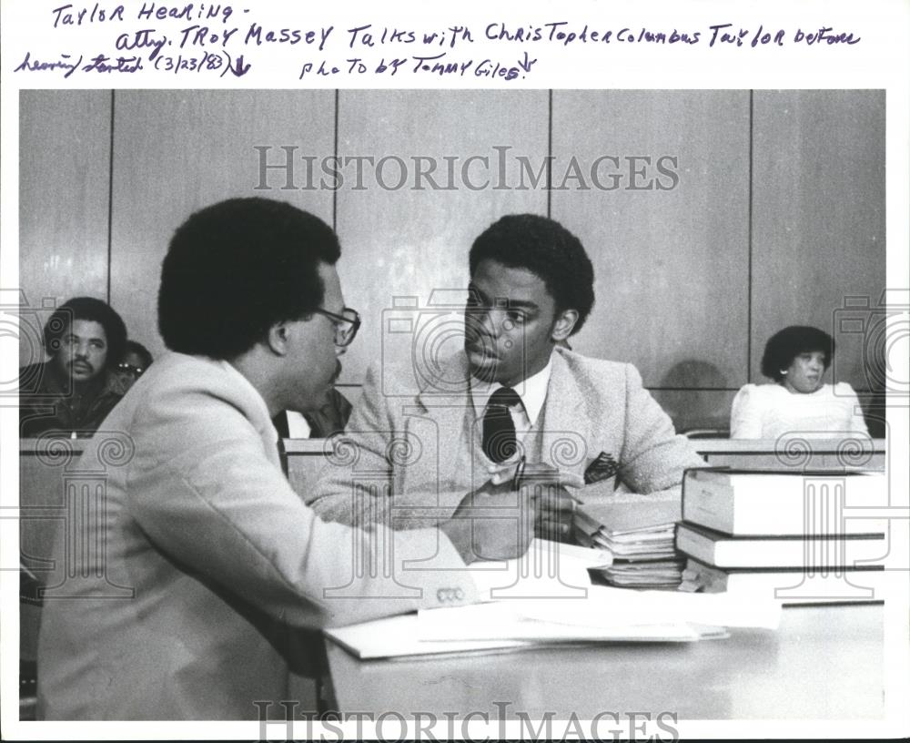 1983 Press Photo Attorney Troy Massey talks with Christopher Columbus Taylor - Historic Images