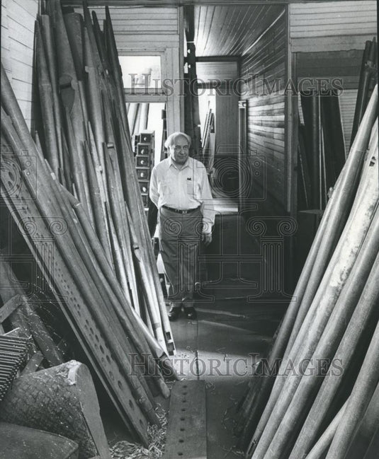 1977 Press Photo Norville Hall builds Organ, Pipes in Storage Room - abna30325 - Historic Images