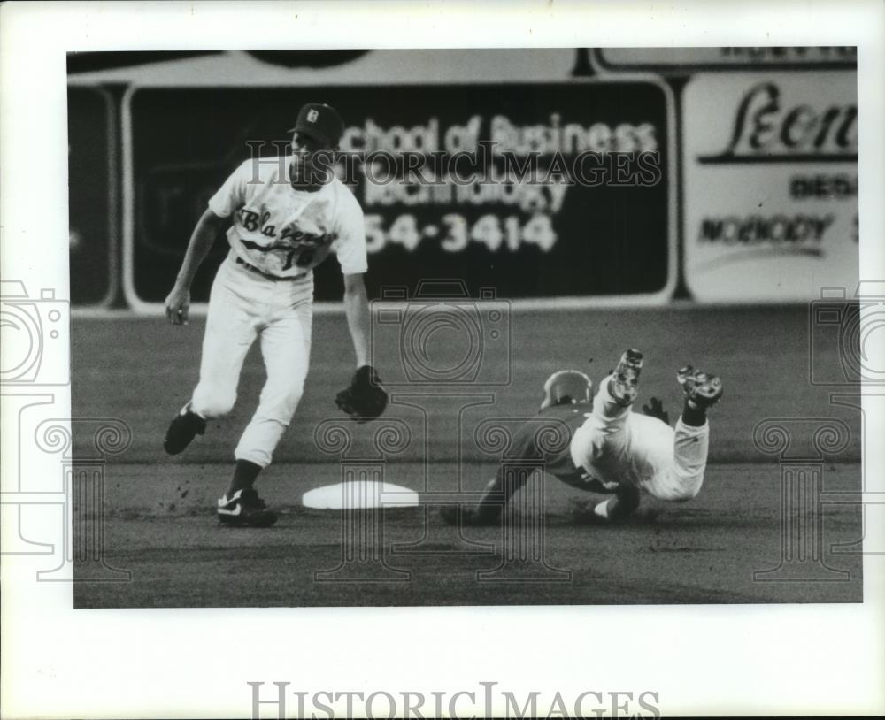 Press Photo Blazers Baseball Player with Other in Game on Baseball Field - Historic Images