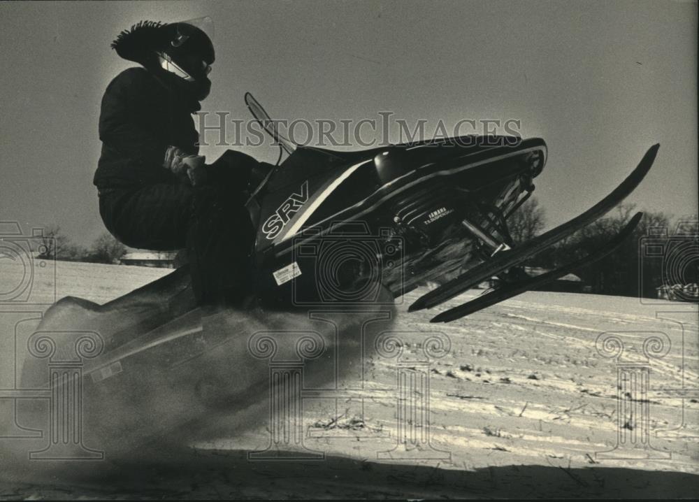 1988 Press Photo Scott Wiese went airborne with his snowmobile - mjc01358 - Historic Images